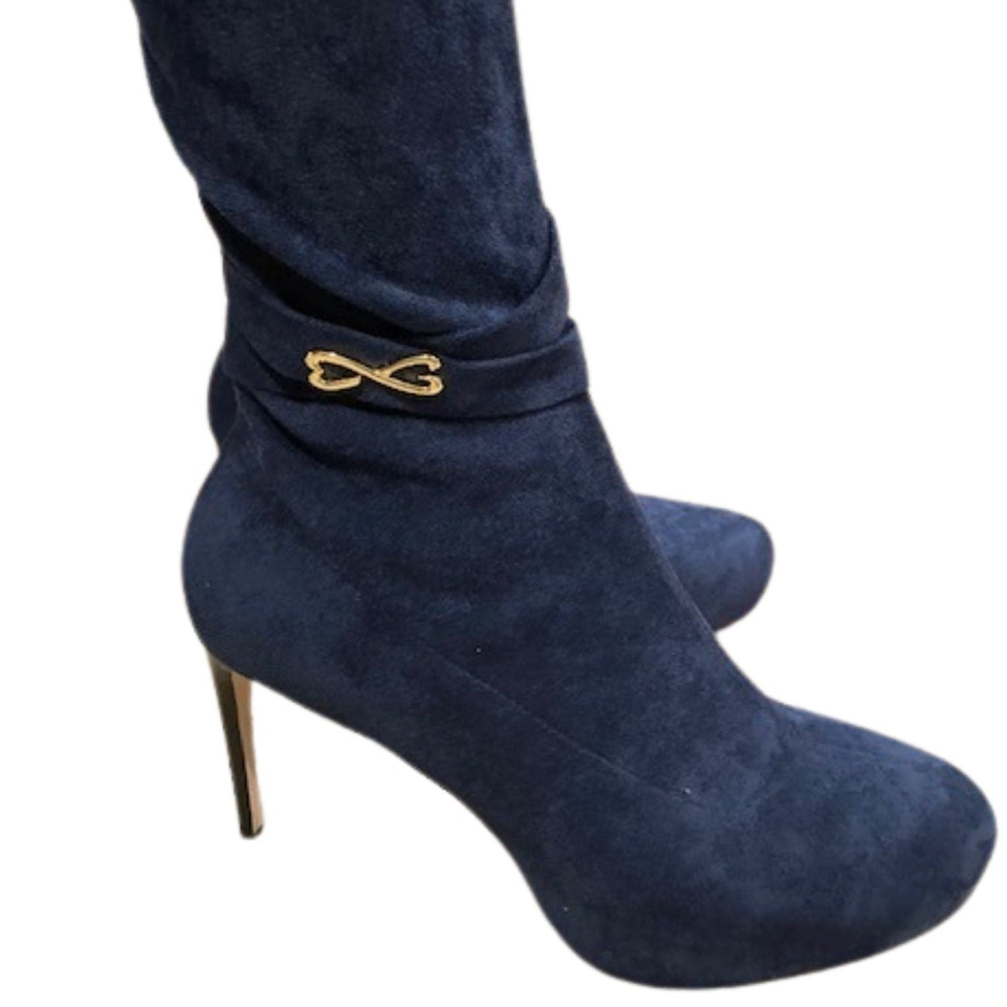 blue suede boot with ankle strap and hardware